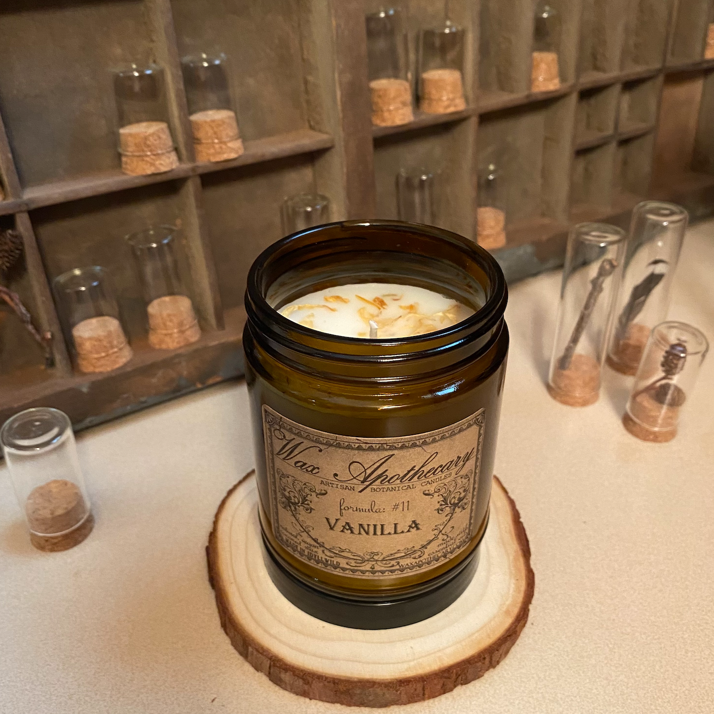 Vanilla 6oz Botanical Candle in Amber Glass Jar w/ Black Lid